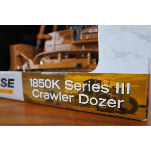 344 - A boxed ERTL Case 1850K Series III crawler dozer.