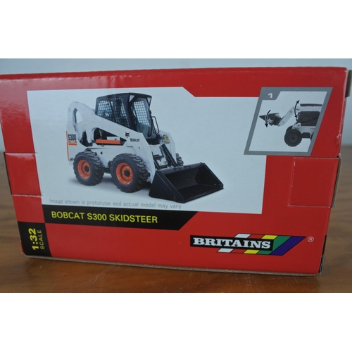 345 - A boxed Britains Bobcat S300 skidsteer.