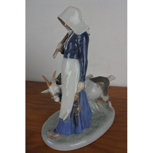 360 - A large Royal Copenhagen figurine 694 'Girl with Goats' (a/f).