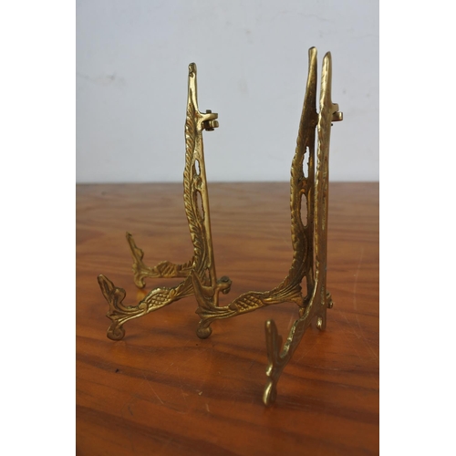 387 - Two brass picture stands.