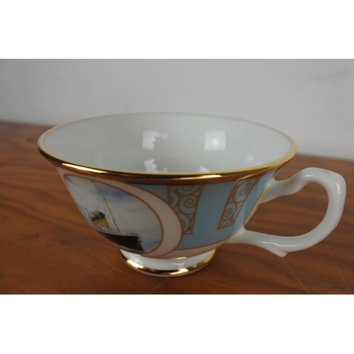 393 - A boxed RMS Titanic cup and saucer by Vacation International Praestigium Limited.