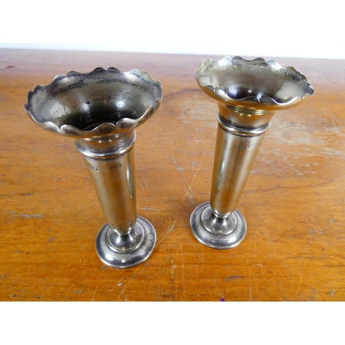 400 - A pair of silver plated bud vases.