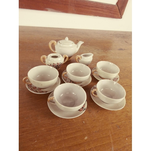 422 - A miniature dolls teaset.