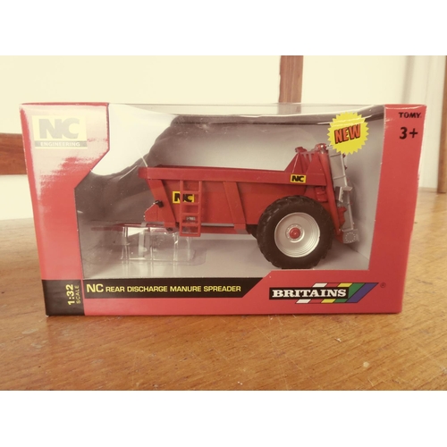 424 - A boxed Britains NC rear discharge manure spreader.