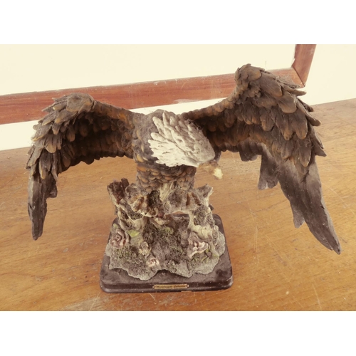 439 - A Michelangelo figurine of an eagle.