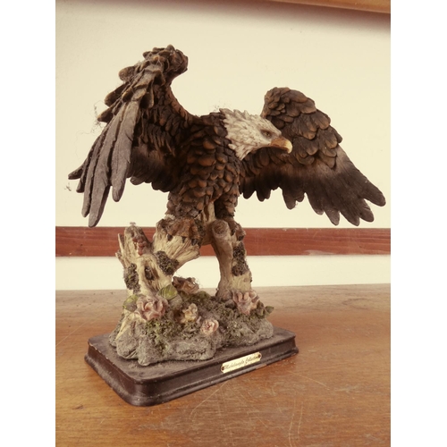 439 - A Michelangelo figurine of an eagle.