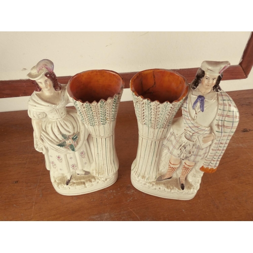 441 - A pair of antique Staffordshire figurines (a/f)