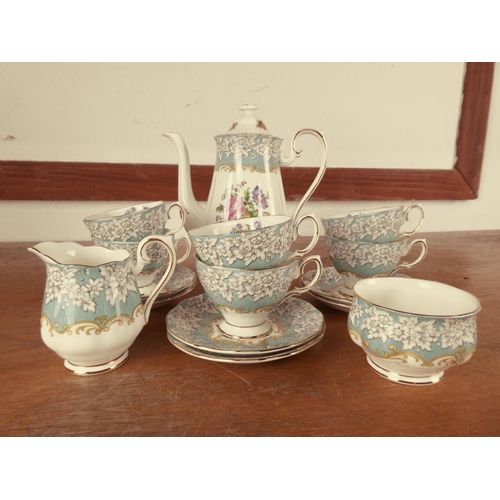 442 - A stunning Royal Albert 'Enchantment' bone china coffee set.