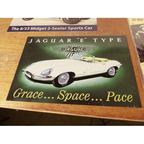 459 - A large collection of metal classic car advertising posters and more.