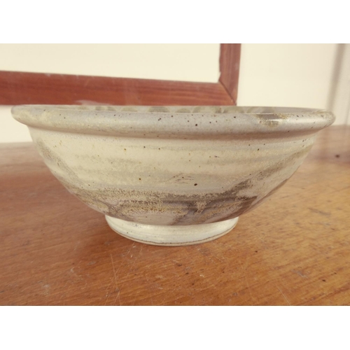 466 - A studio pottery bowl signed.