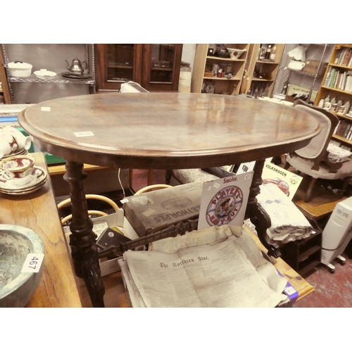 468 - A stunning antique mahogany oval library table.