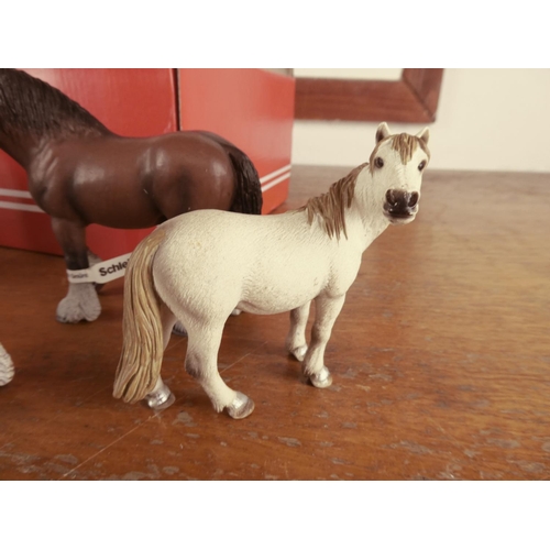 480 - A large collection of Schleich toy horses some with original labels.