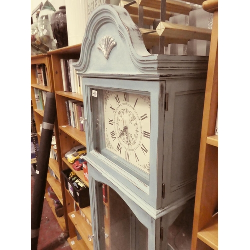 489 - A stunning painted clock case clock with display case.