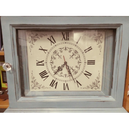 489 - A stunning painted clock case clock with display case.