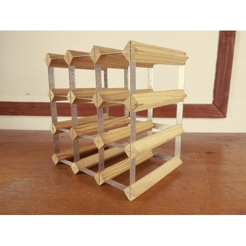 490 - A 9 bottle wine rack.