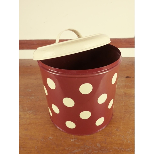 492 - A large red and cream dotted metal storage container