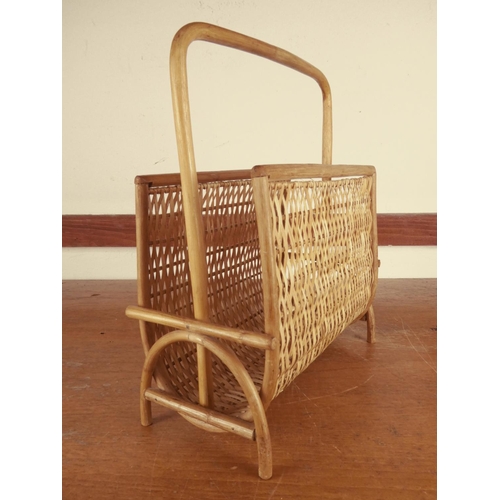 493 - A vintage wicker magazine rack.