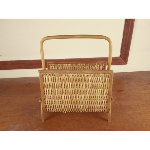 493 - A vintage wicker magazine rack.