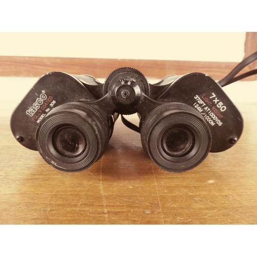 500 - A set of Tasco binoculars, fully coated model No. 306 No. 7940.