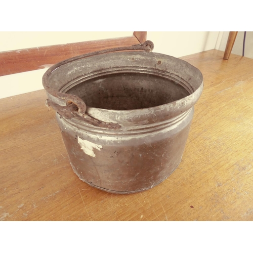 515 - An antique copper bucket, measuring 30cm.