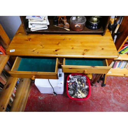 524 - A pine desk with 2 drawers, measuring 74cm X 98cm X 48cm.