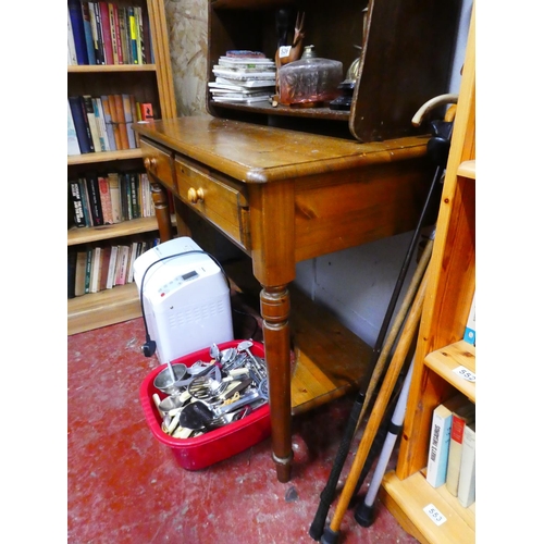 524 - A pine desk with 2 drawers, measuring 74cm X 98cm X 48cm.