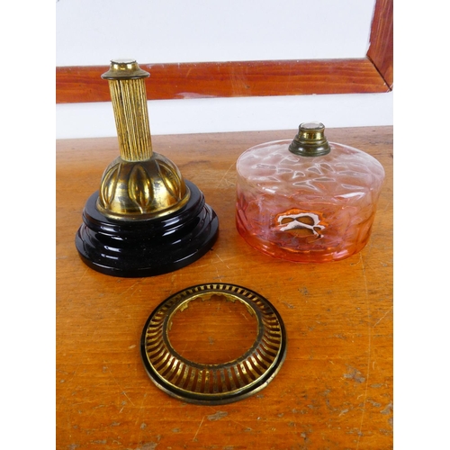 527 - An antique peach glass oil lamp reservoir oil font and brass pedestal.