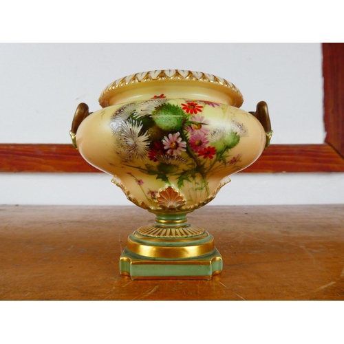 534 - A Royal Worcester vase, measuring 13cm tall.