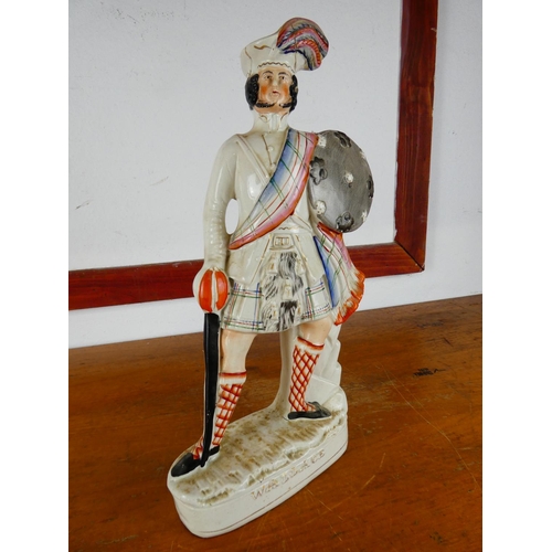 536 - An antique Staffordshire figure of William Wallace, measuring 43cm tall. (A/f).