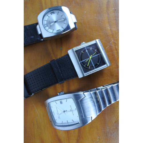 586 - A gents Henleys wrist watch and two others .