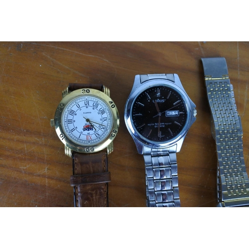 588 - An Accurist wrist watch and two others.