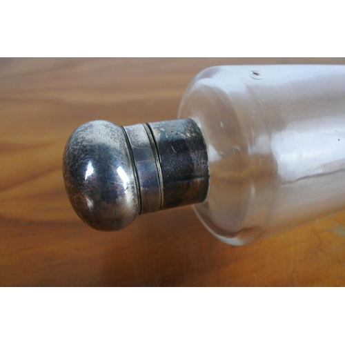 626 - A large vintage glass perfume bottle with silver plated collar and stopper.