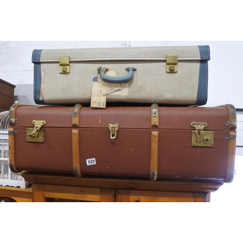 629 - A large vintage steamer trunk and suitcase.