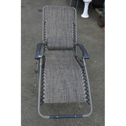 34 - A folding deck chair.