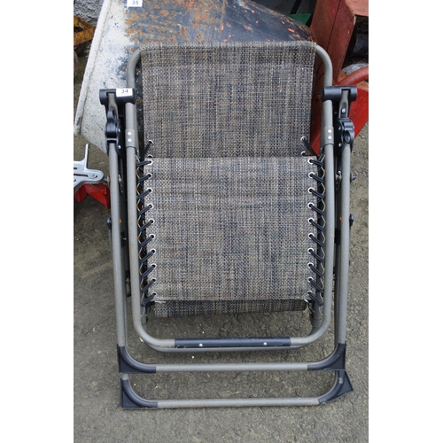 34 - A folding deck chair.