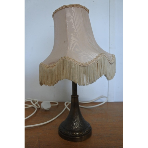 88 - A brass table lamp with shade.