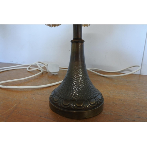 88 - A brass table lamp with shade.