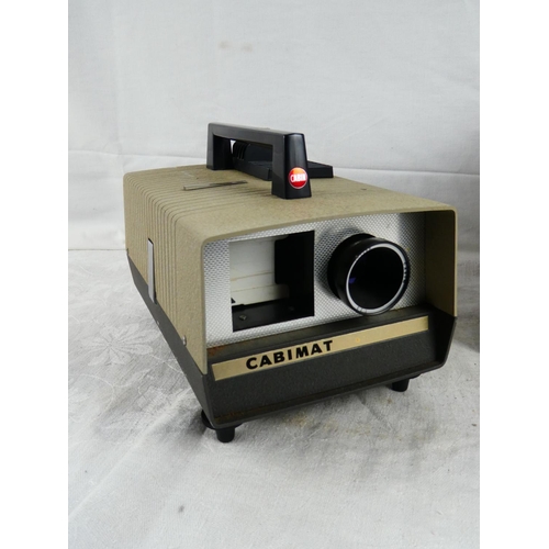 16 - A vintage Cabin slide projector in its original wooden box.