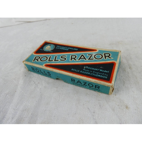 22 - A vintage boxed Rolls Razor in its original box.