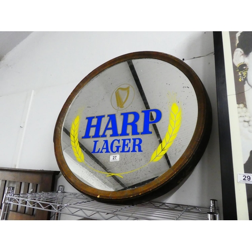 27 - A large vintage framed Harp Lager pub mirror, measuring 72cm x 72cm.