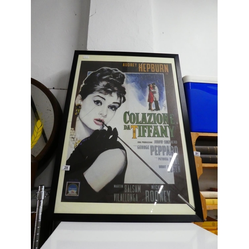 29 - A large Audrey Hepburn framed Breakfast at Tiffanys print (glass damaged).