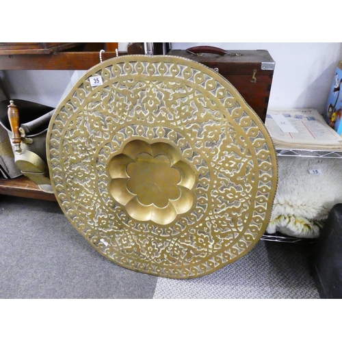 35 - A stunning large antique brass panel with decorative design, measuring 75cm x 75cm.