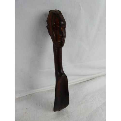 45 - An African wooden bust wall plaque, letter opener and shoe horn.