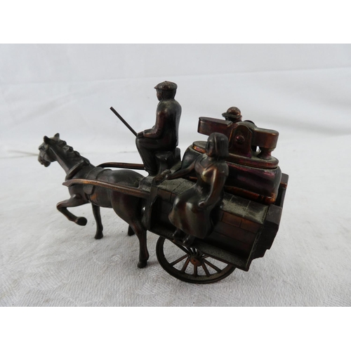 63 - A metal Irish jaunting horse and cart with lighter.