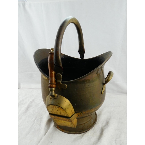 7 - A large brass coal bucket and shovel.