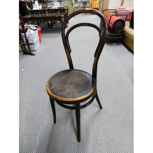 571 - A vintage bentwood chair.