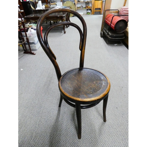 571 - A vintage bentwood chair.