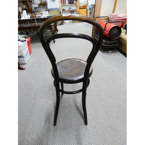 571 - A vintage bentwood chair.