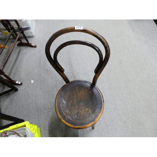 571 - A vintage bentwood chair.