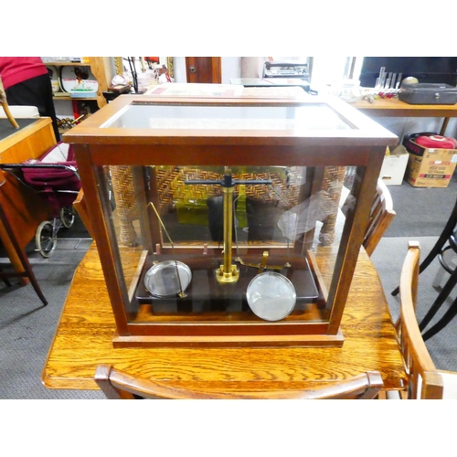 574 - A cased set of antique/ vintage chemists scales.